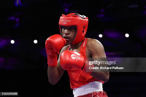 Cindy Winner Djankeu Ngamba of Refugee Olympic Team looks on against Davina Michel of Team France during the Women's 75kg Quarter-final match on day...