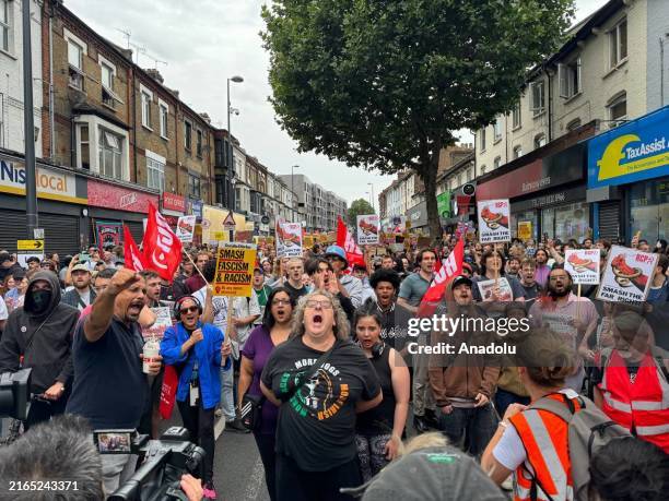 People stage a demonstration against anti-immigration protests in Walthamstow, London, United Kingdom on August 07, 2024.