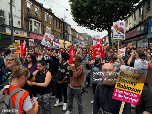 People stage a demonstration against anti-immigration protests in Walthamstow, London, United Kingdom on August 07, 2024.