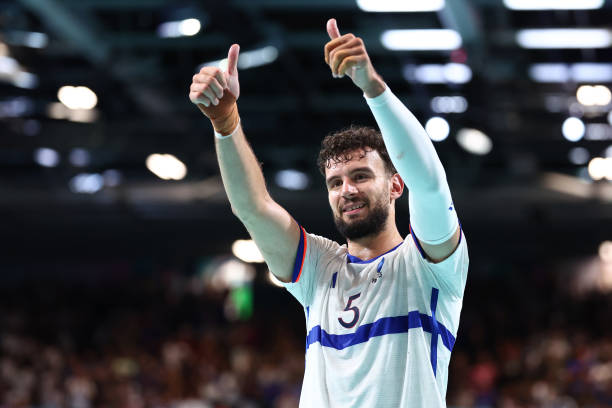 Nedim Remili of Team France celebrates a win after the Men's Preliminary Round - Group B match between Team France and Team Hungary on day nine of...