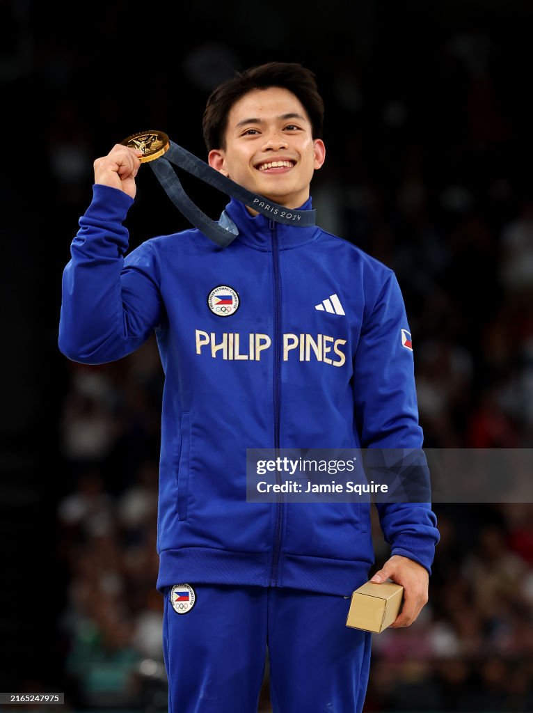 Yulo Image Gold medalist Carlos Edriel Yulo of Team Philippines celebrates on ...
