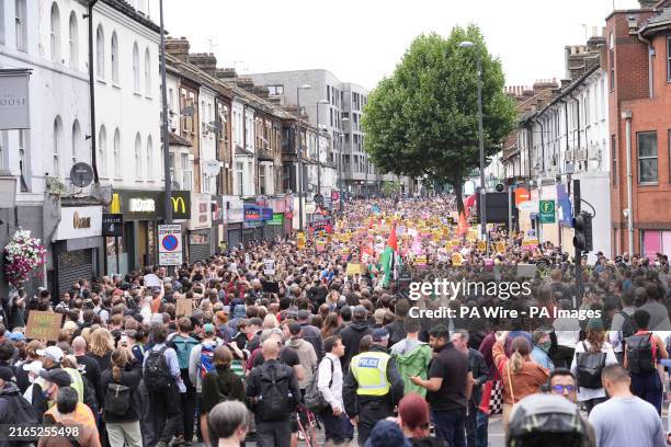 Demonstrators at an anti-racism protest in Walthamstow, London. Picture date: Wednesday August 7, 2024.