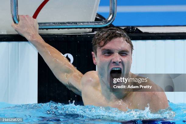 Bobby Finke of Team United States celebrates after winning gold in a world record time in the Men's 1500m Freestyle Final on day nine of the Olympic...