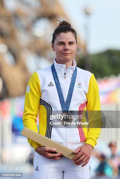 Bronze medalist Lotte Kopecky of Team Belgium poses on the podium during the Women's Road Race on day nine of the Olympic Games Paris 2024 at...