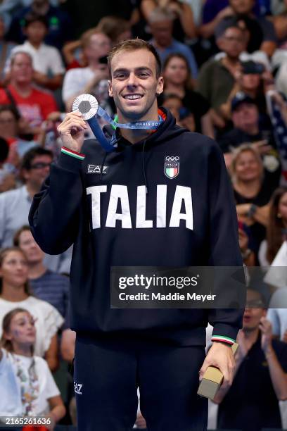 Silver Medalist Gregorio Paltrinieri of Team Italy poses on the podium during the Swimming medal ceremony after the Men's 1500m Freestyle Final on...
