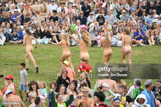The annual Wilderness cricket match takes place on the playing field during Wilderness Festival 2024 at Cornbury Park on August 04, 2024 in...