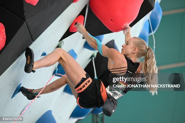 Germany's Lucia Doerffel competes in the women's sport climbing lead semi-final during the Paris 2024 Olympic Games at Le Bourget Sport Climbing...