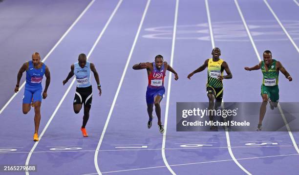 Noah Lyles of Team United States crosses the finish line to win the Men's 100m Final on day nine of the Olympic Games Paris 2024 at Stade de France...