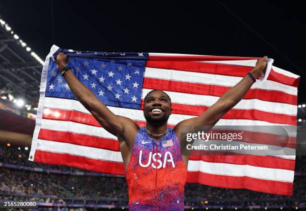Noah Lyles of Team United States celebrates winning the gold medal after competing the Men's 100m Final on day nine of the Olympic Games Paris 2024...