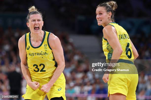 Sami Whitcomb and Steph Talbot of Team Australia celebrate after a play during a Women's basketball Group Phase - Group B game between Australia and...