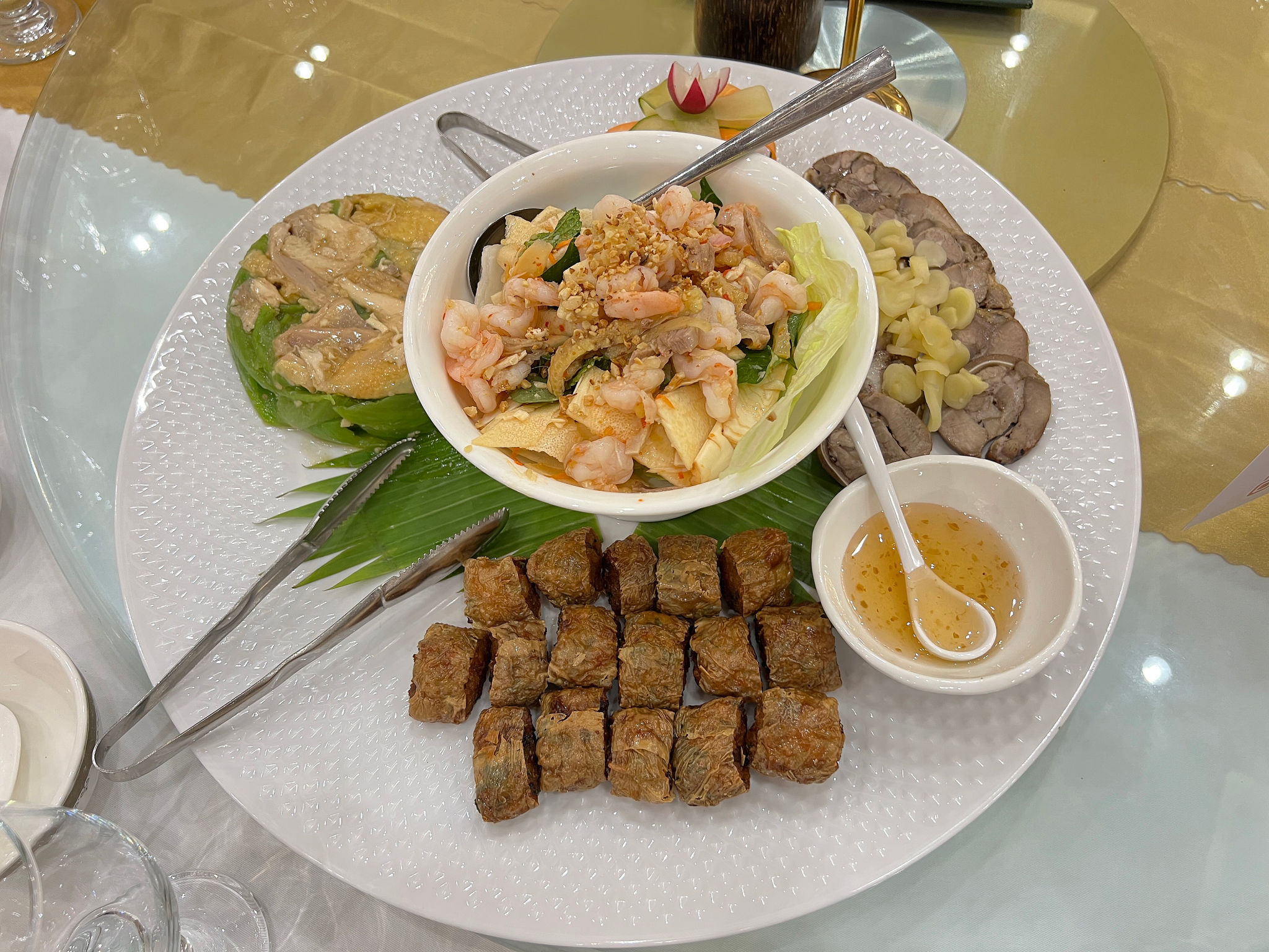 A platter comprising an assortment of appetizers for Chinese banquet-style dining A platter comprising an assortment of appetizers for Chinese banquet-style dining