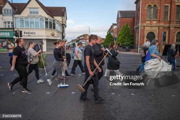 Members of the Middlesbrough community come together to clean up their streets after far-right activists destroyed property following riots on August...