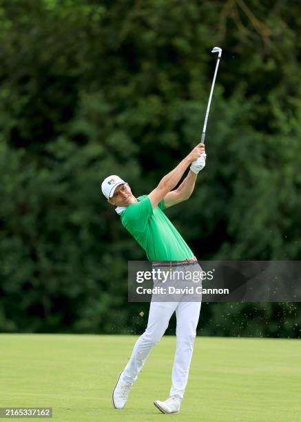 Carlos Ortiz of Mexico plays his second shot on the first hole on day nine of the Olympic Games Paris 2024 at Le Golf National on August 04, 2024 in...