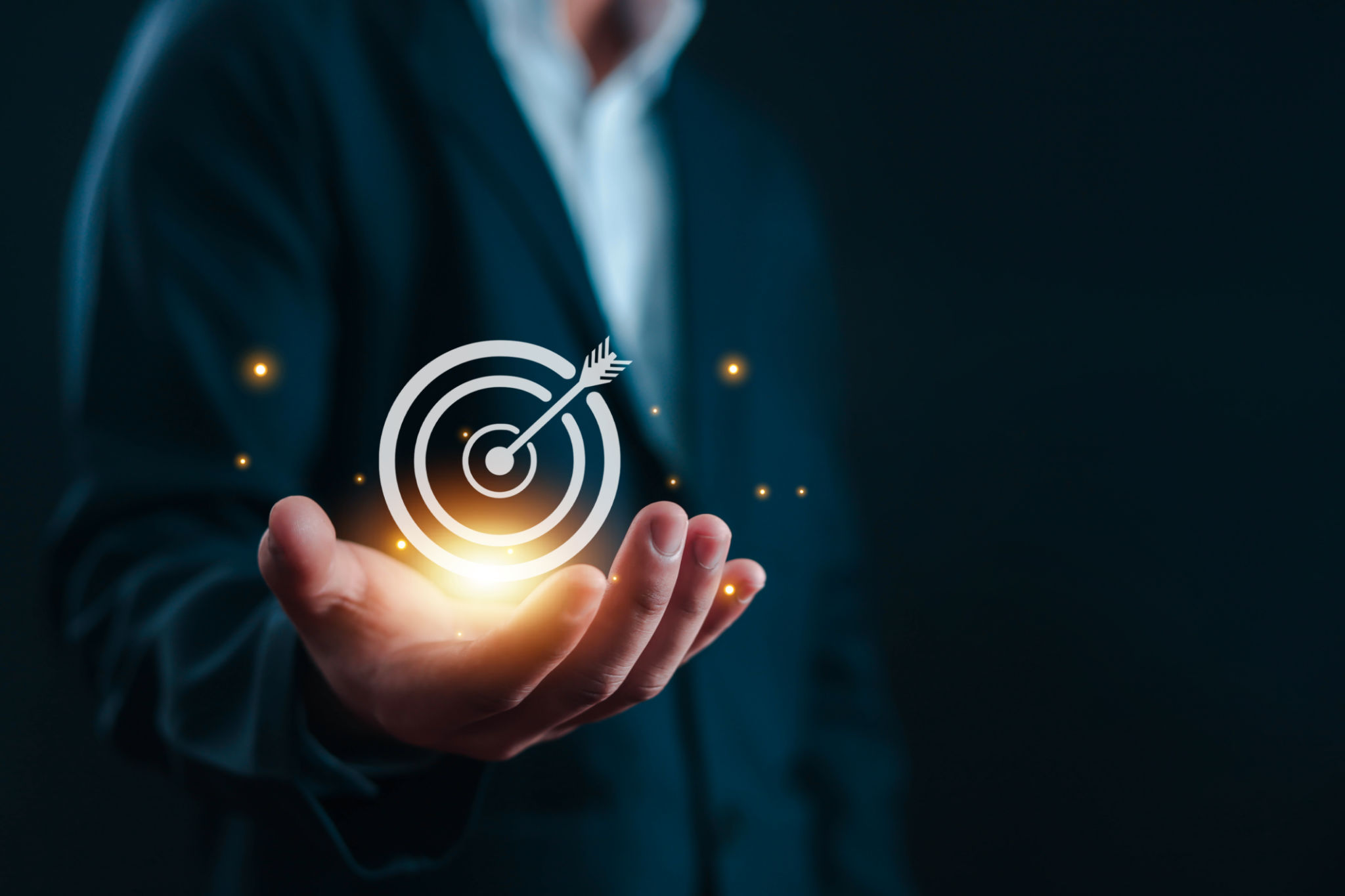 Businessman holding target icon Businessman holding target icon