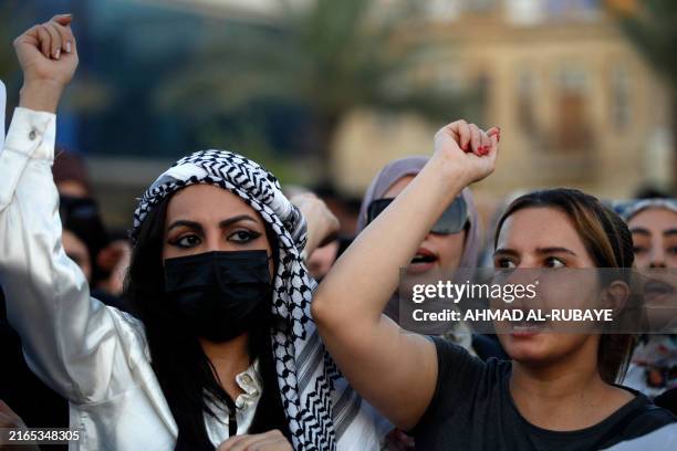 Iraqi women demonstrate against underage marriage in Tahrir Square in central Baghdad on August 8 amid parliamentary discussions over a proposed...