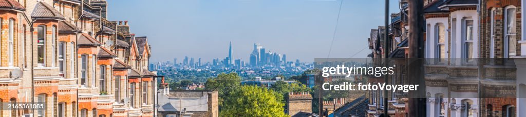 London iconic cityscape skyscrapers framed between suburban homes panorama