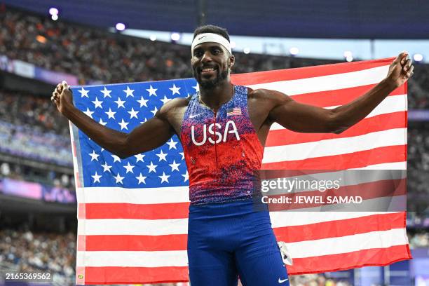 Kenneth Bednarek celebrates after finishing second in the men's 200m final of the athletics event at the Paris 2024 Olympic Games at Stade de France...