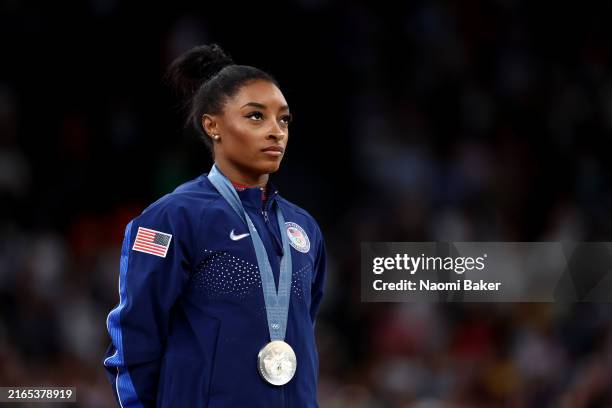 Silver medalist Simone Biles of Team United States poses on the podium at the Artistic Gymnastics Women's Floor Exercise Medal Ceremony on day ten of...
