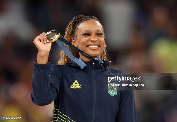 Gold medalist Rebeca Andrade of Team Brazil poses on the podium at the Artistic Gymnastics Women's Floor Exercise Medal Ceremony on day ten of the...