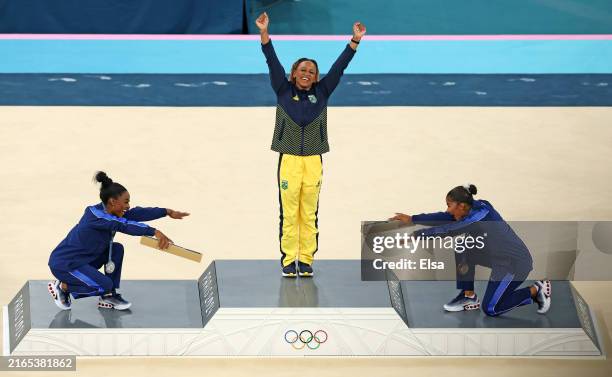 Gold medalist Rebeca Andrade of Team Brazil, silver medalist Simone Biles of Team United States and bronze medalist Jordan Chiles of Team United...