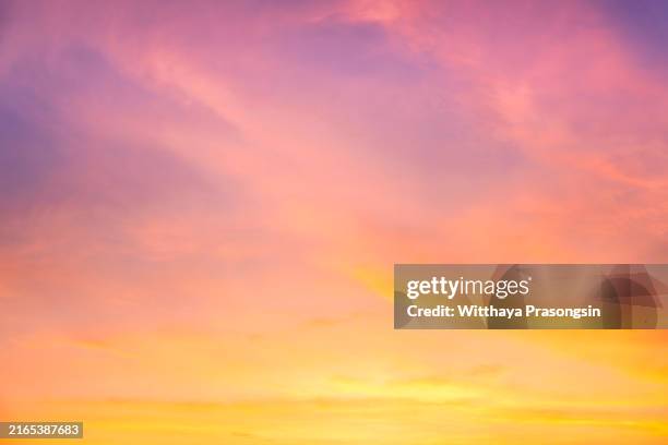 cloudy sky and bright sun rise over the horizon. - dusk stock pictures, royalty-free photos & images