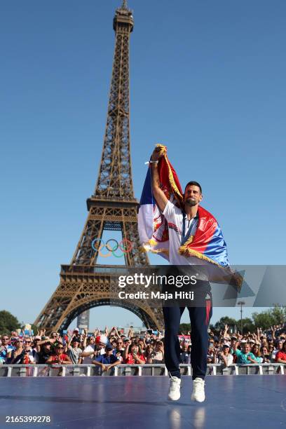 Men's Tennis Singles gold medalist Novak Djokovic of Team Serbia poses for a photo with his medal at Champions Park on day ten of the Olympic Games...