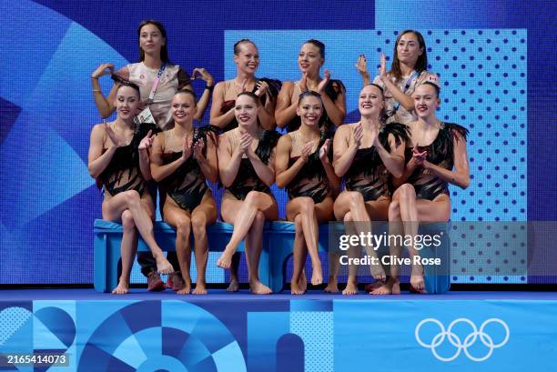 Members of Team Canada react after competing in the Team Technical Routine on day ten of the Olympic Games Paris 2024 at Aquatics Centre on August...