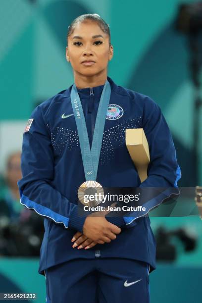 Bronze medalist Jordan Chiles of Team United States poses on the podium at the Artistic Gymnastics Women's Floor Exercise Medal Ceremony on day ten...