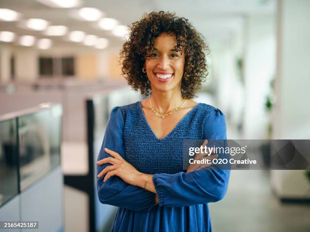 portrait of a woman in an office - shallow focus people stock pictures, royalty-free photos & images