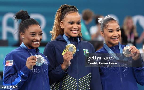 Gold medalist Rebeca Andrade of Team Brazil, silver medalist Simone Biles of Team United States and bronze medalist Jordan Chiles of Team United...