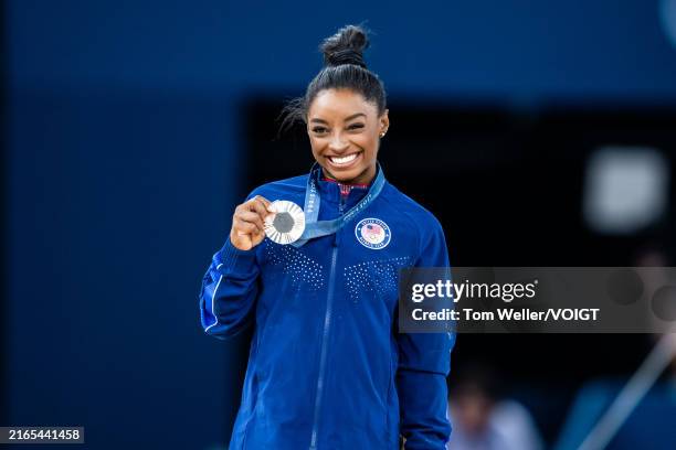 Silver medalist Simone Biles of Team United States celebrates after the Artistic Gymnastics Women's Floor Exercise Final on day ten of the Olympic...