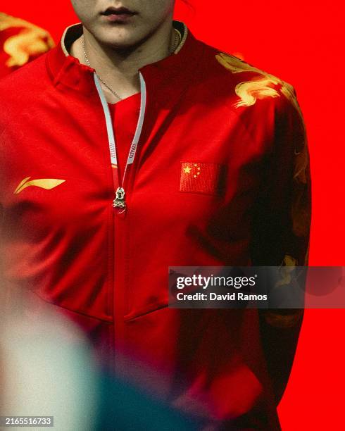 Meng Chen of Team People's Republic of China looks on during the Table Tennis Women's Team Round of 16 match Team Egypt on day ten of the Olympic...