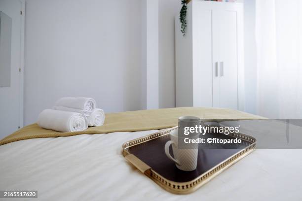relaxing bedroom with modern decor - bedroom wall decor stock pictures, royalty-free photos & images