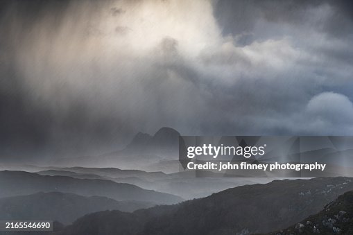 Suilven mountain dome in heavy hail. Scottland Suilven mountain dome in heavy hail. Scottland
