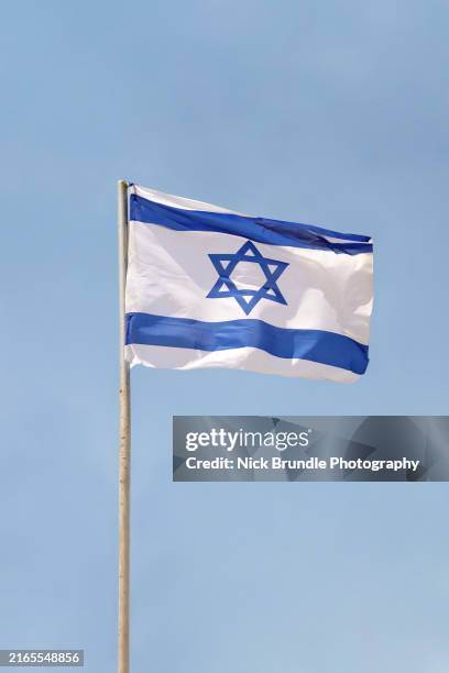 the israeli flag - pole stock pictures, royalty-free photos & images