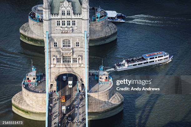 aerial close up view of tower bridge, london uk - water taxi london stock pictures, royalty-free photos & images