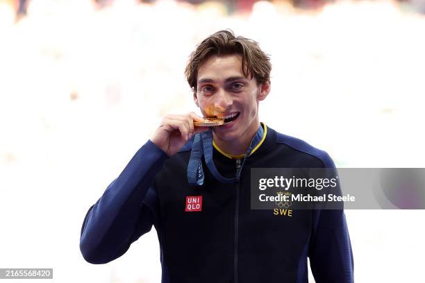 Gold medalist Armand Duplantis of Sweden celebrates on the podium during the the Men's Pole Vault medal ceremony on day eleven of the Olympic Games...