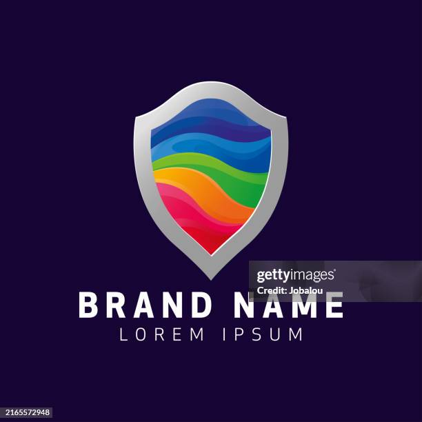 multicolored gradient shield icon symbol design - superhero shield stock illustrations