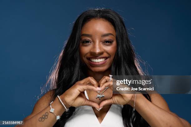 Olympian Simone Biles poses for a photo at the USA House at Paris 2024 on August 06, 2024 in Paris, France.