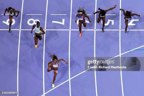 Gabrielle Thomas of Team United States celebrates winning the gold medal after competing in the Women's 200m Final on day eleven of the Olympic Games...