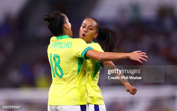 Adriana of Team Brazil celebrates scoring her team's third goal with teammate Gabi Portilho during the Women's semifinal match between Brazil and...