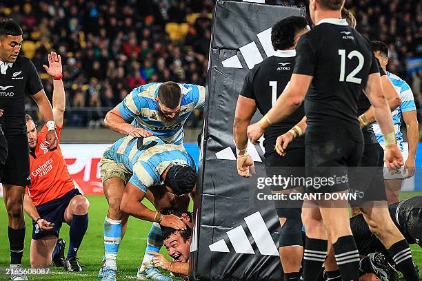 Argentina's Agustin Creevy celebrates scoring a try during the Rugby Championship match between New Zealand and Argentina at Sky Stadium in...