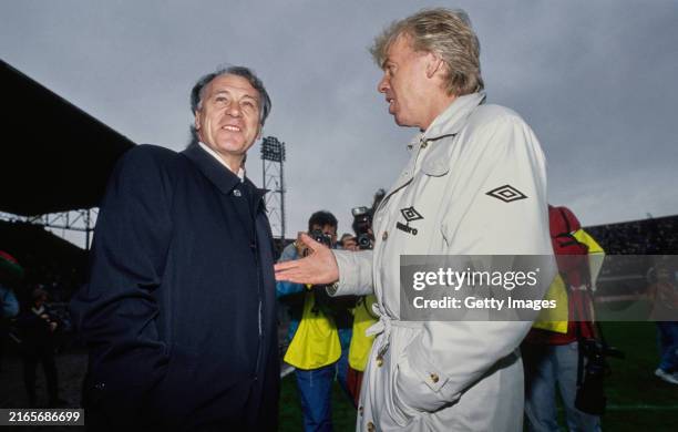 Manager Bobby Robson chats with Leo Beenhakker coach of Ajax during a match between Ajax and PSV Eindhoven on October 28th, 1990 in Amsterdam,...