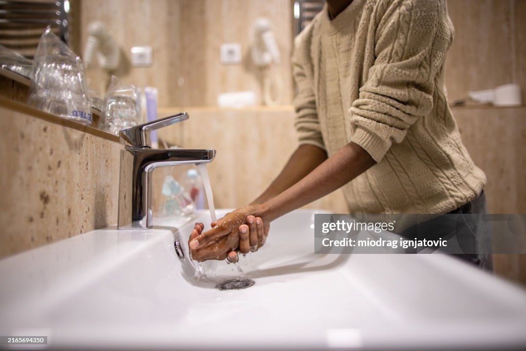 Woman washing hands