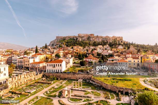 aerial view of acropolis and plaka historic district on a sunny day, athens, greece - acropolis athens stock pictures, royalty-free photos & images