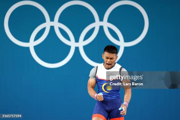 Mohamad Aniq Bin Kasdan of Team Malaysia reacts during the Weightlifting Men's 61kg on day twelve of the Olympic Games Paris 2024 at South Paris...