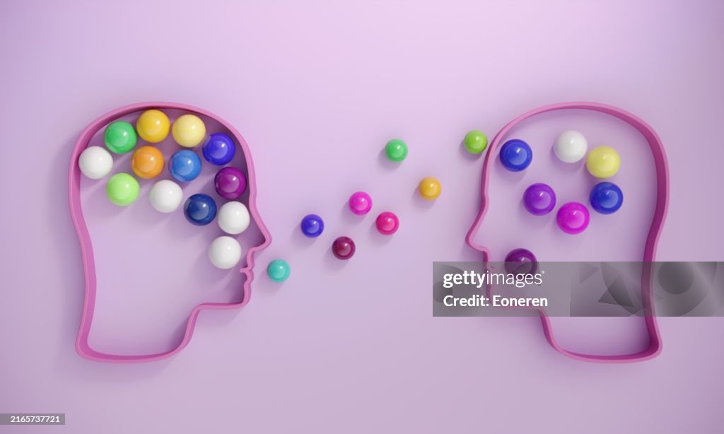 Cabeças com esferas multicoloridas