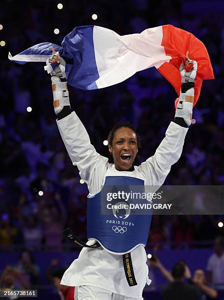 Althea Raj French France's Althea Laurin celebrates with a French flag after winning in ...