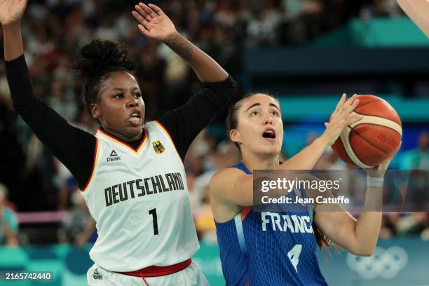 Marine Fauthoux of Team France and Alexis Peterson of Team Germany during Women's Basketball Quarterfinal game between Team France and Team Germany...