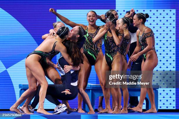 Members of Team United States react after competing in the Team Acrobatic Routine on day twelve of the Olympic Games Paris 2024 at Aquatics Centre on...
